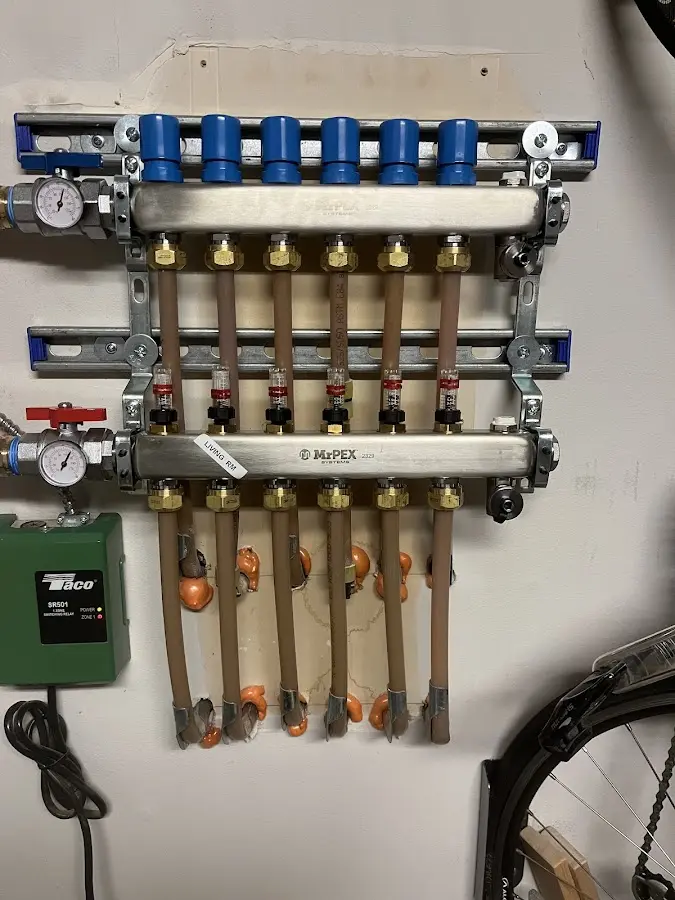 Plumber performing Water Heater Repair at a residential property in Aliquippa